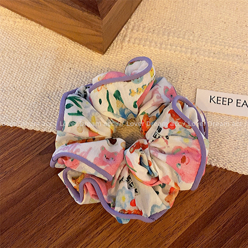 Wholesale of Colored Bear Floral Fabrics Hair Scrunchies